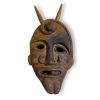 Representação artesanal,em madeira de amoreira,do Chocalheiro de Bemposta,Máscara